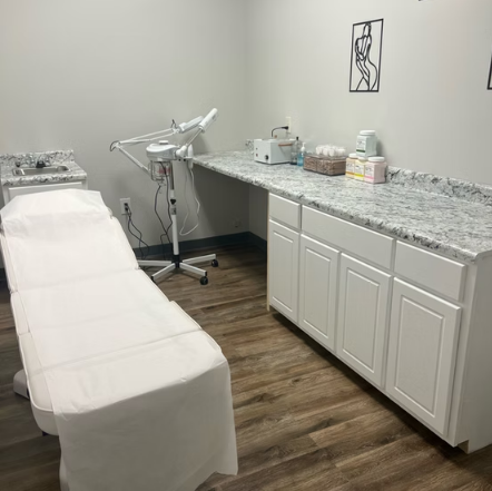 The private treatment room at Dahomey Goddess Wax Studio — a fresh, clean waxing bed and counter set up for your first visit